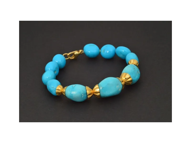 Pulsera de oro con turquesas