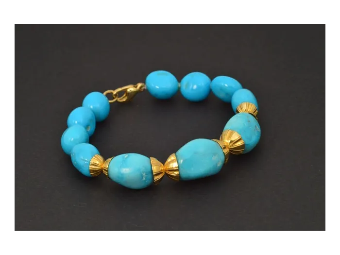 Pulsera de oro con turquesas