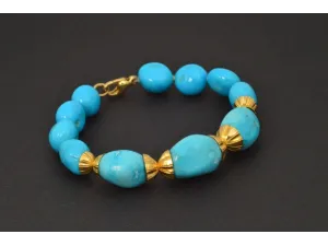 Pulsera de oro con turquesas