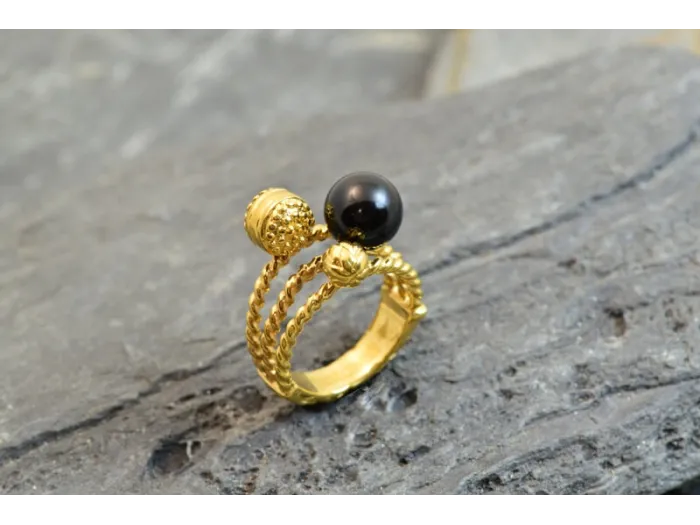 Anillo de bisuteria con perla