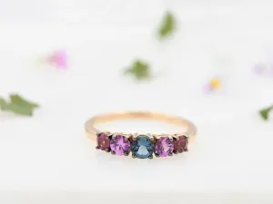 Anillo oro rosa 18k con topacio london blue, zafiros rosas y turmalinas. Hecho a mano y se entrega certificado.