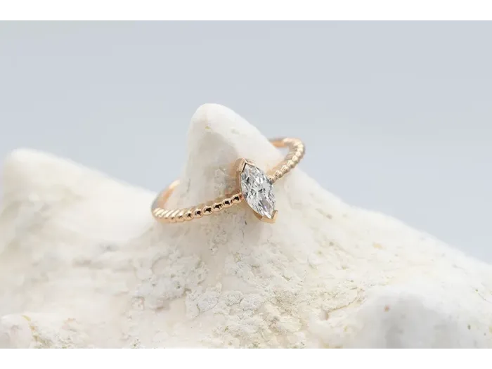 Rose Gold Solitaire Ring with Marquise-Cut Diamond