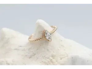 Rose Gold Solitaire Ring with Marquise-Cut Diamond