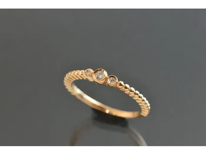 Anillo de Oro Rosa con Brillantes de 0,045 qt