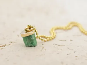 Pendant with raw Emerald