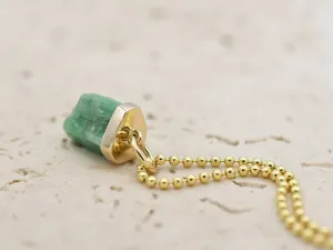 Pendant with raw Emerald