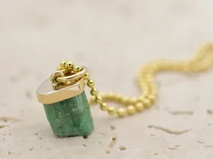 Pendant with raw Emerald