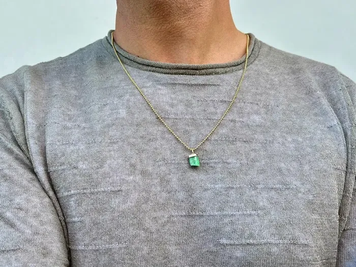 Pendant with raw Emerald