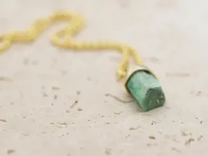 Pendant with raw Emerald