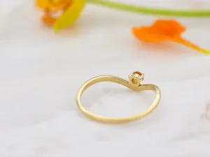 Wave Ring in Gold with Emerald