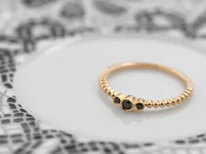 Anel de Ouro Rosa con Diamantes Negros