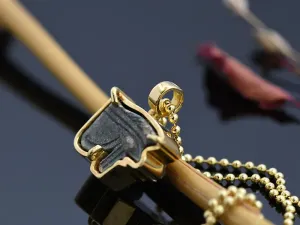 Gold Pendant with Ancient Egyptian Amulet. Eye of Horus