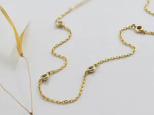 Gold choker with black diamonds