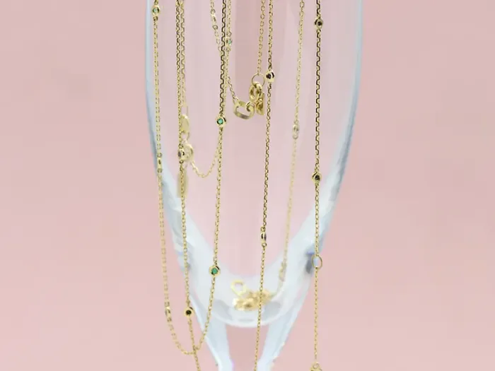 gold choker with emeralds