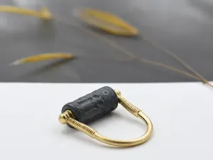 Gold Ring With a Rotating Seal